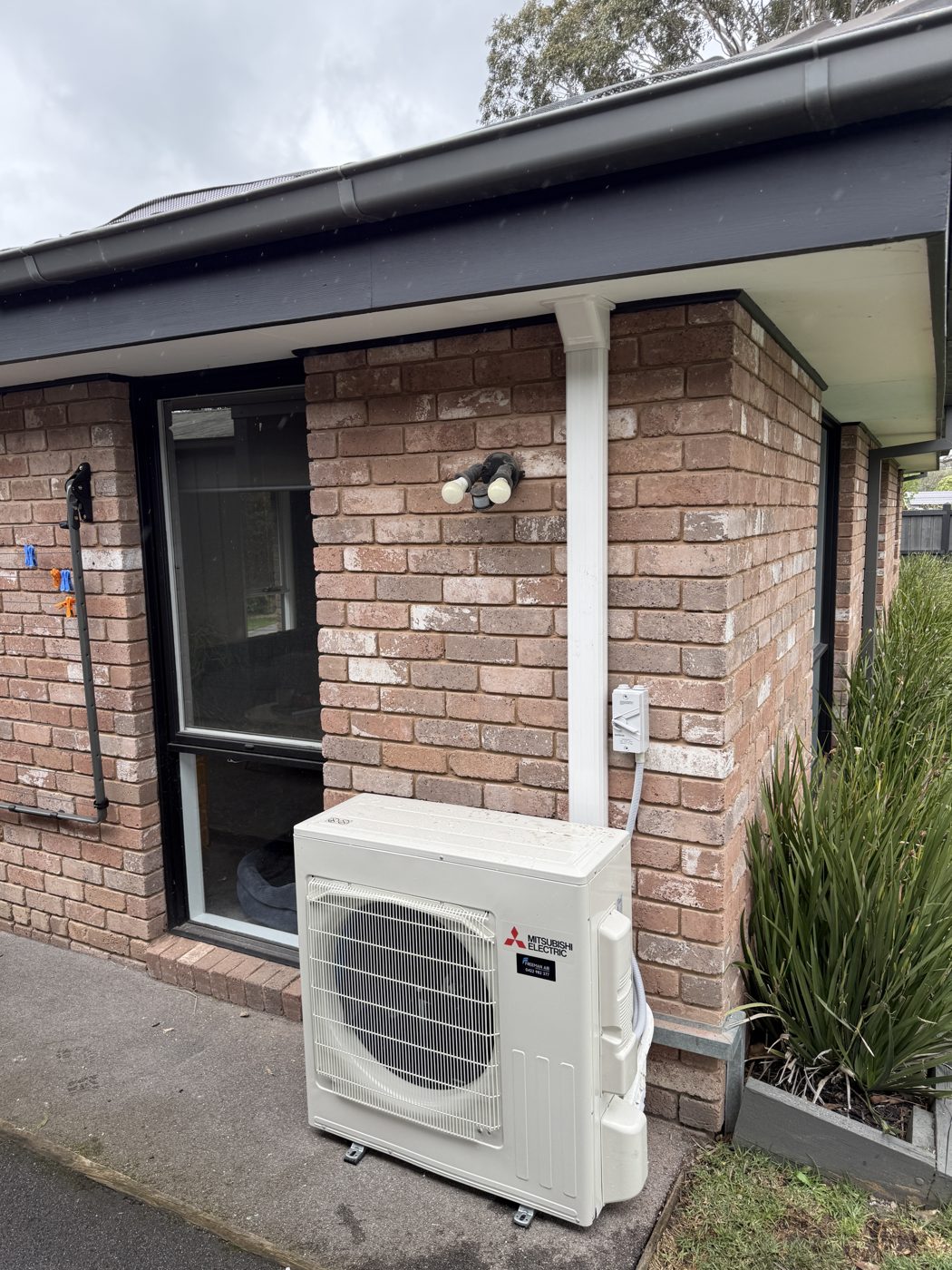 Outdoor air conditioning unit installed by Freeman Air
